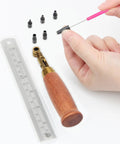 Heavy Duty Brass Leather Hole Punch With A Comfy Wooden Handle with drill bits and ruler for crafting and DIY.