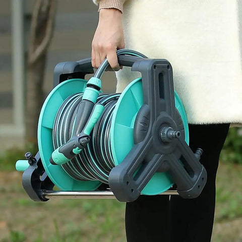 Pretty Slick Portable Garden Hose Reel With High Pressure Water Gun, No Tangle Wall Mount Storage Rack, Grab And Go Carry Handle shown being carried.