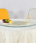 Big Ol Tempered Glass Lazy Susan Turntable For Dining Table Large Tabletop Rotating Tray with fruit bowl and vase centerpiece.