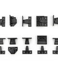 Rock Solid Adjustable Push Fittings For Panel Frames Black Makrolon Brackets arranged in various positions on a white background.