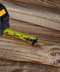 ToughSeries 35 Ft Tape Measure With Magnetic Hook Double Sided Readout Ultra Durable Housing shown on wooden surface