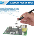 Hand using vacuum pen from 852A Pro SMD Digital Hot Air Rework Station With Vacuum Pickup Tool to lift IC from circuit board
