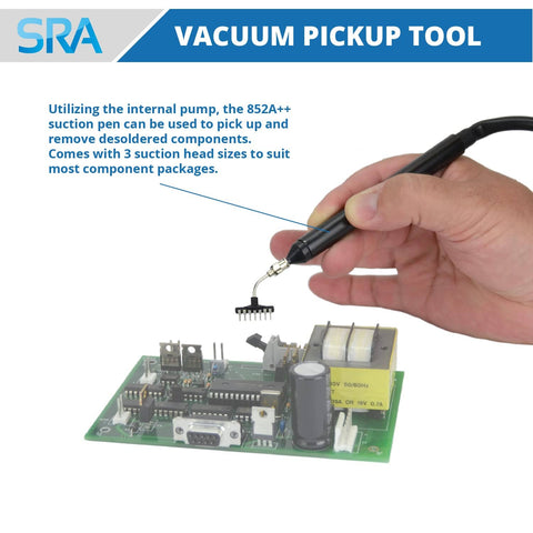 Hand using vacuum pen from 852A Pro SMD Digital Hot Air Rework Station With Vacuum Pickup Tool to lift IC from circuit board