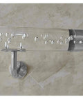 Sleek Transparent Acrylic Handrail With Heavy Duty Silver Wall Mount Brackets For Indoors Outdoors Stair And Deck Safety Featuring Bubble Design Supporting Four Hundred Forty Pounds Built Like A Tank For Daily Grind close-up view with bubbles.
