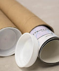 Solid As A Rock Kraft Mailing Tubes For Shipping And Storage Extra Strong Spiral Wound Design, open end showing tight cap and rolled document.