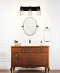 Vintage Vibes Wall Light Fixture With 3 Clear Glass Shades In Matte Black Finish over bathroom mirror