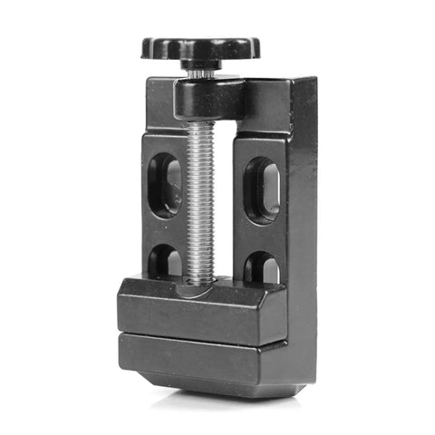 Premium Aluminum Mini Bench Vise Heavy Duty Clamping Vice With Hella Smooth Pivot And Locks Down Tight on a black aluminum clamp.