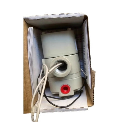 Electric proportional valve in box, gray plastic body with red port and attached wiring