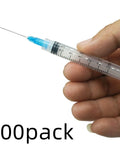 Hand holding 15 Pack 3ml 23 Gauge Plastic Syringe With Measurement For Lab Use And Industrial Dispensing Disposable Individually Wrapped Luer Lock 1 Inch Barrel Secure Cap