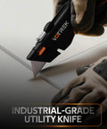 VOTREK box cutter utility knife with orange accents, retractable blade, close-up view