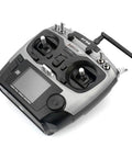 AT9S 10CH 2.4G Radio Transmitter with Handy Carry Case and Rocker Mount showing control sticks and display screen.