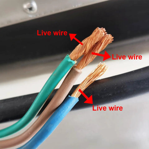 Close-up of live wires in electrical cables showing copper strands, indicating proper wiring connections.
