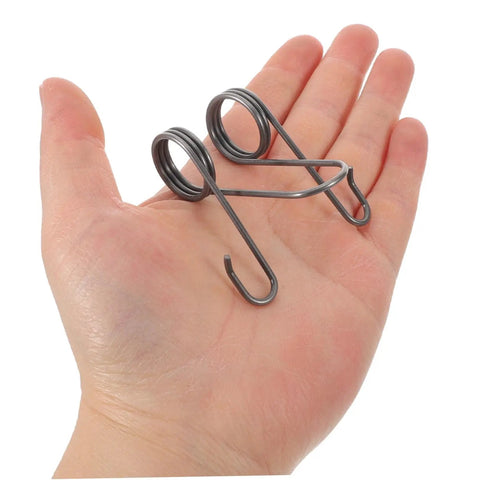 Beefy Heavy Duty Steel Torsion Spring Replacement Pack 2 Easy Install Seeding Parts For Farm Seeders And Corn Planters Wear Resistant High Strength Gear For Garden And Field Use, two silver steel springs in hand