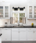 Three Light Black Vanity Light Fixtures Over Mirror With Seeded Glass Shades Industrial Wall Mount Lamps For The Bathroom Metal Bathroom Lighting Dope Modern Look installed in a kitchen