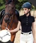 Woman wearing 1.5 Inch Elastic Equestrian Belt With Bit Buckle And Leather Key Strap For Horse Riding Enthusiasts next to horse.