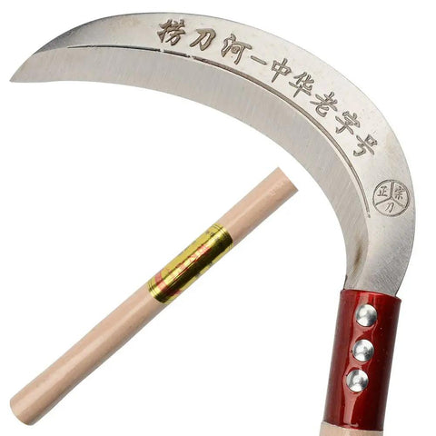 Close-up of multipurpose grass sickle with hardwood handle and manganese steel blade, designed for weeding vines and small shrubs.