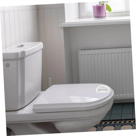 Bathroom scene with a self-adhesive handle on a toilet lid, highlighting the Two Pack Self Adhesive Cabinet Handles And Sliding Door Pulls.
