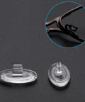 Slide Right In Nose Pads 5 Pairs Ultra Smooth Silicone Glasses Replacement Anti Slip Oval Eyewear Cushions on black background.