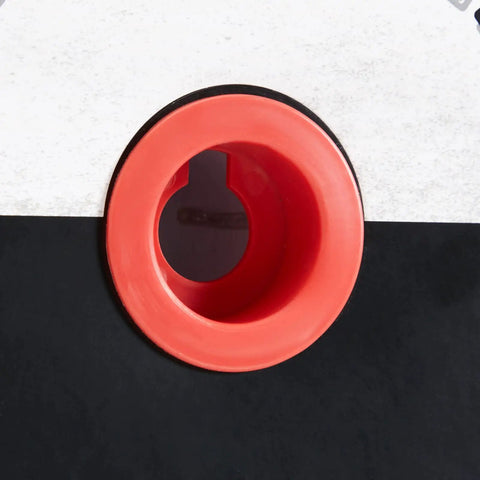 Close-up of 1.5-inch link in 100 Foot Orange Plastic Chain Safety Barrier For Crowd Control And Event Lines against black background.