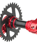 Red bicycle crankset with chainring and bottom bracket attached, suitable for Blue Aluminum Bottom Bracket 68 To 73mm BSA Threaded.