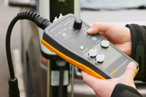 Slick Heavy Duty Type One Electric Vehicle Charging Station Diagnostic Adapter For Testing Level 1 And Level 2 Ac Systems With Gfci And Ground Safety Checks Plug Right In, showing close-up controls.