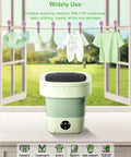 Game Changing Foldable Portable Mini Washing Machine With Sixteen Liter Capacity And Three Deep Wash Modes, displayed with laundry.
