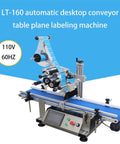 Straight Up Efficient 110V Quick Setup Automatic Desktop Conveyor Bottle Labeler Pro With Smart Touch Screen Display For Round Cosmetics Beverages And Grocery Stock on a blue background.