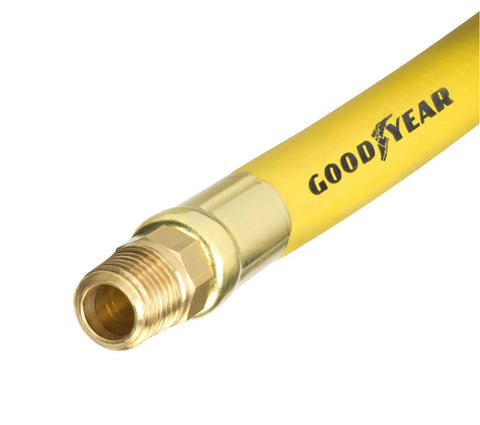 Close-up of Six Foot By Three Eighth Inch Rubber Whip Hose Yellow 250 PSI With Brass End Fittings And Reinforced Abrasion Resistant Outer Jacket