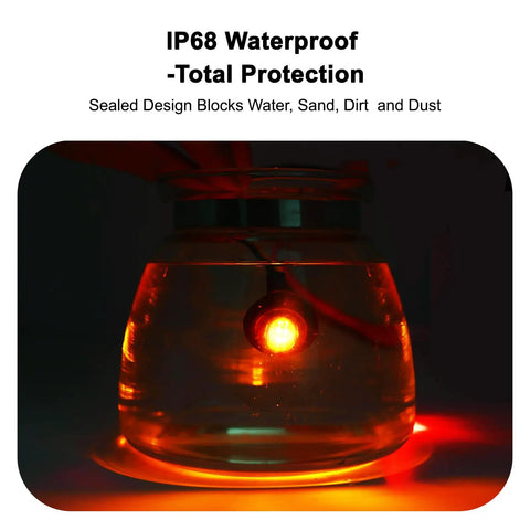 20 Pack Three Quarter Inch LED Marker Lights 3rd Gen Round Mini Amber Red Clearance Lights submerged in water showcasing IP68 waterproof