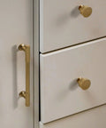 1.17 Inch Champagne Bronze Cabinet Knobs Set Of 2, Solid Zinc Alloy, Rust Resistant, mounted on white dresser drawers