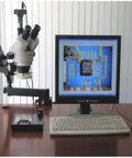 Professional Trinocular Stereo Zoom Microscope With Long Working Distance For Precision Inspection Of Circuits And Dental Appliances Includes 10x Wide Field Eyepieces For Clear Comfortable Viewing on arm stand beside monitor