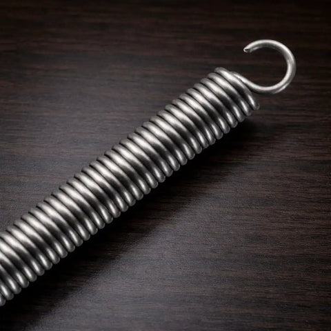 OTF Knife Spring Replacement Kit 12 Steel 304 Springs For Ultratech UT Series Knives on a wooden surface