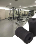 2 Pack Sponge Foam Foot Pad Roller Replacement For Leg Extension And Curl Machines, shown in a gym setting with equipment.