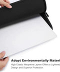 Hands holding Watertight Scuba Inspired Laptop Tote Bag With Heavy Duty Padding For 12 Inch Laptops showing protective interior.