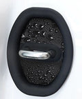 Slick Auto Door Lock Buffers Shield Metal Buckles From Gnarly Scratches While Acting As Sound Deadening Cushions For A Tight Fit And Super Smooth Shuts On Your Daily Driver Keeping Trim Fresh, close-up of black silicone cushion with raindrops.