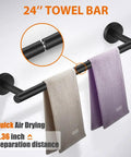 Matte Black Stainless Steel Bathroom Hardware Set With 24 Inch Hand Towel Bar displaying two towels wall mounted