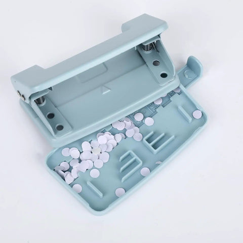 Heavy Duty Metal Two Hole Punch For A4 A5 B5 Paper shown open with chip tray filled, blue, 10 sheet capacity, office workhorse.