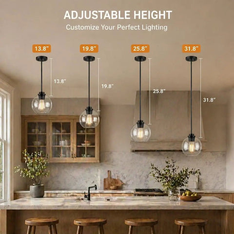 Straight Up Matte Black Globe Pendant Lights 2 Pack With Clear Glass Shades adjustable height options in kitchen setting.