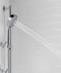 Forte All-In-One Handshower Kit with Slide Bar and 60-Inch Hose, 3-Spray Handheld Showerhead in use, Polished Chrome finish.