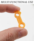 Close-up of an orange piece from the 16 Piece Bird Splay Leg Treatment Ring Set With 3.5mm 4mm 5mm 6mm Holes