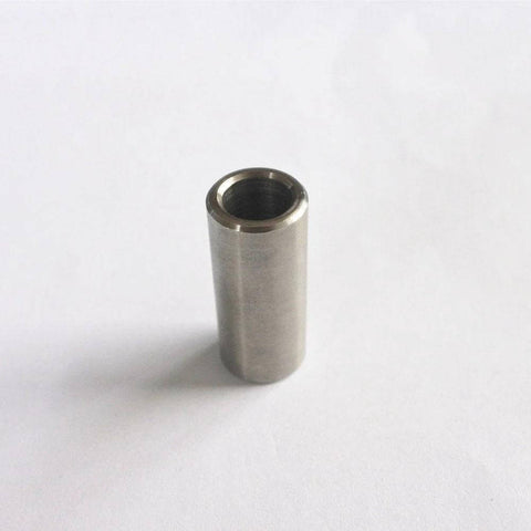 Mixing chamber spacer for water jet cutting, metal cylindrical insert with hollow bore, silver