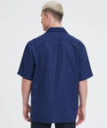 Men's Short Sleeve Work Shirt In Navy Blue Cotton Poly Blend Durable Button Front Uniform Features Double Chest Pockets Built Hella Tough For The Daily Grind And Extra Large Cut, back view.