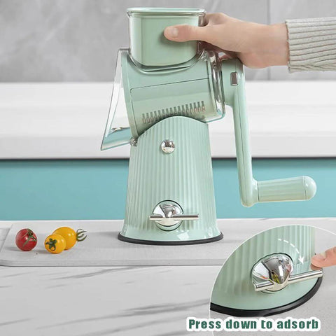 Side view of mint green 5-in-1 hand-crank kitchen grater and slicer with hopper attachment.