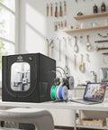Side view of Tough As Nails 3D Printer Enclosure With LED Light for A1 and A1 Mini, installed in a workspace, showcasing its compact design.
