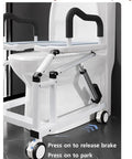 Real Smooth Electric Toilet Raiser Chair With Locked Grip Handles, Solid Build Mobile Commode For Seniors showing 360° steering and 4-wheel brakes.