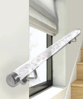 Slick Clear Acrylic Railing System Paired With Sleek Silver Brackets Custom Cut One To Seven Meters Long mounted along a stairway.