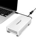 Grab This Top-Shelf Aluminum U.2 NVMe SSD Enclosure USB4 V2 connected to a laptop via cable, showcasing its compact design.