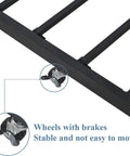 Wheels with brakes on Heavy Duty Twin Trundle Bed Frame Built Tough For Casual Hangouts And Epic Sleepovers Featuring Roll Out Guest Sleeping Platform Base Zero Sag Steel Slats And Easy Glide Lockable Casters Black.