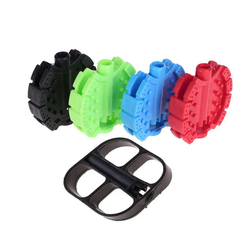Four colorful non slip kid friendly bicycle pedals set for children, trikes, and mountain bikes; replacement bike pedals in durable black and vibrant shades.