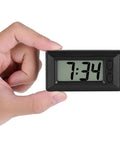 Ultra Thin Digital Clock With Wide Lcd Panel And Adhesive Mount For Car Dashboard Home Desk in hand showing time 7:34